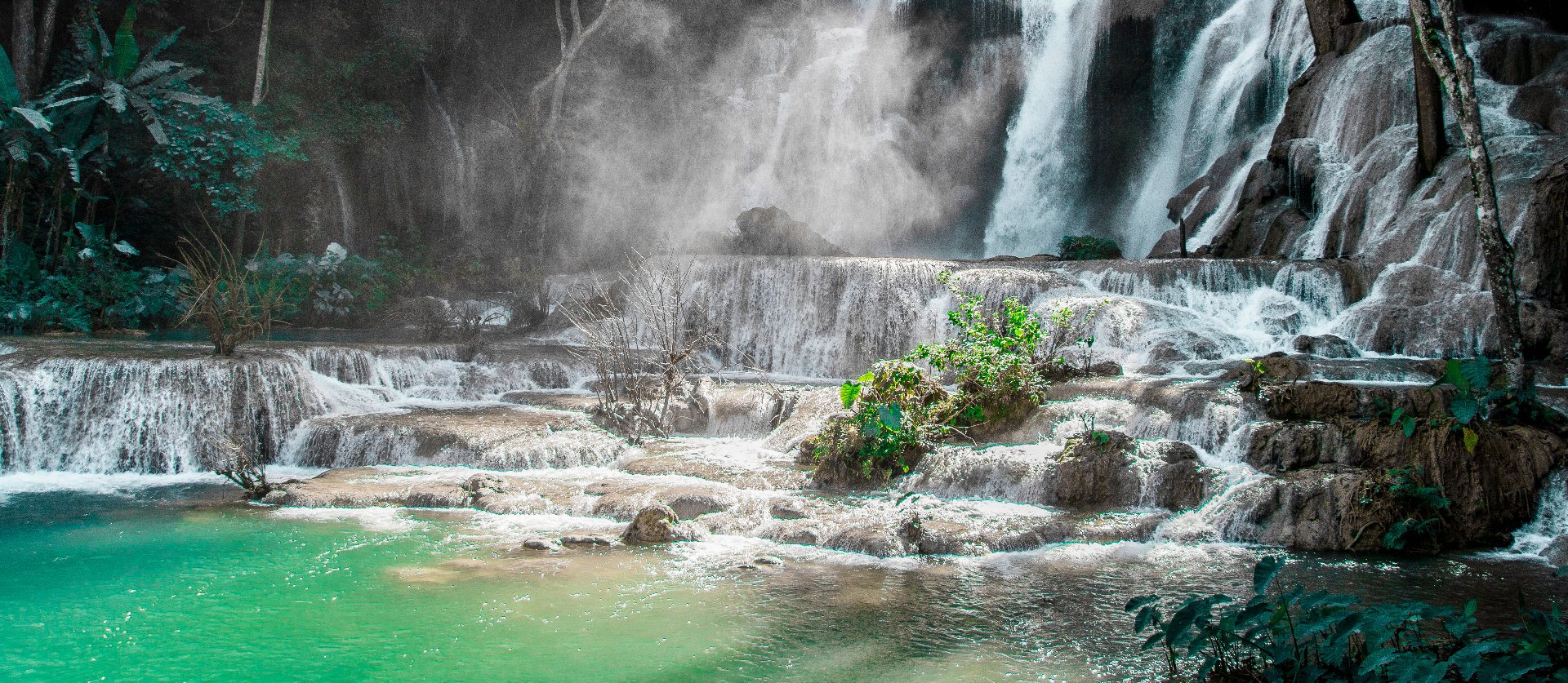 Cascading turquoise waterfall — pure hydration delivered